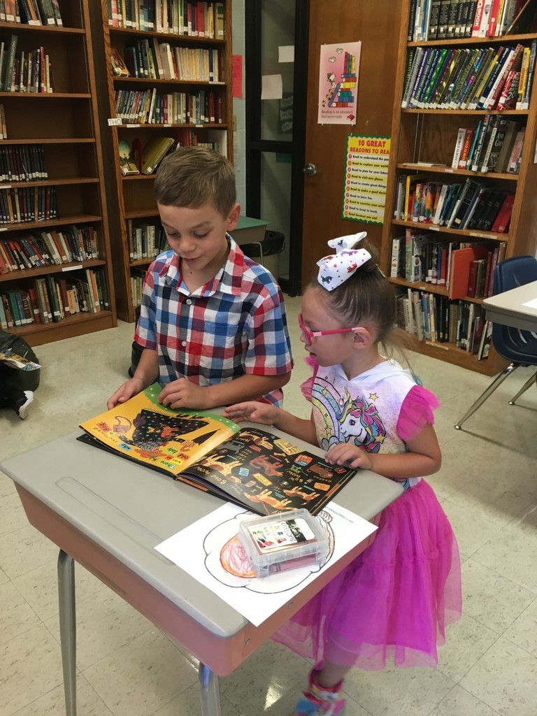 Kindergartners in library